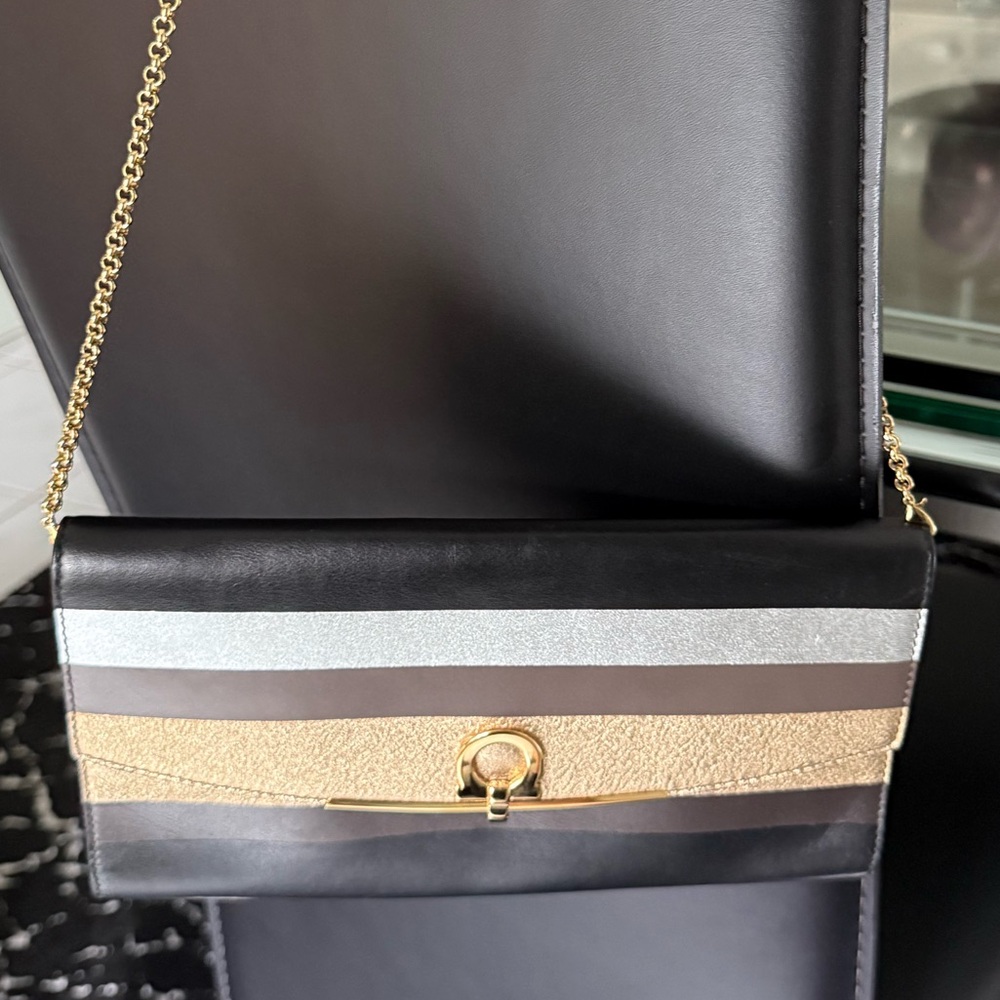 Salvatore Ferragamo Black, Silver, and Gold Clutch